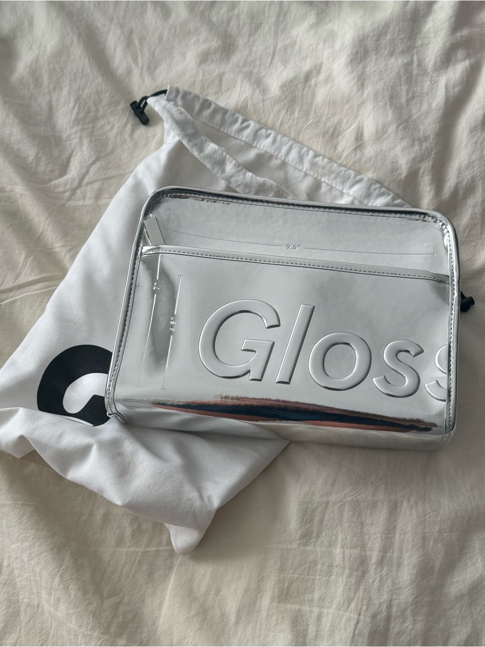 Limited Glossier Chrome make-up bag